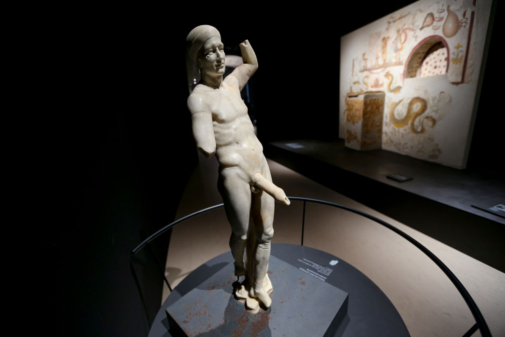 A sculpture representing Priapus, the Greek god of fertility. Photo: Marco Cantile/LightRocket via Getty Images.